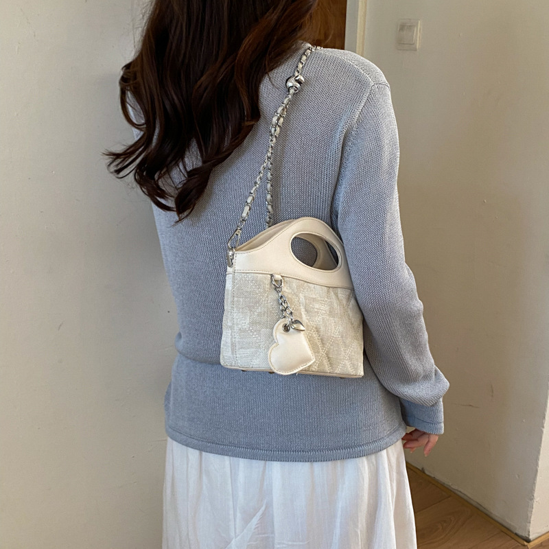 Bolsa de cadena de diamante diaria bolsa de cuero suave de mujer 2026 nuevo verano relajado bolsa de hombro inclinada para viajar