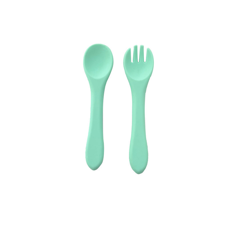 민트 컬러의 포크와 스푼 한 쌍