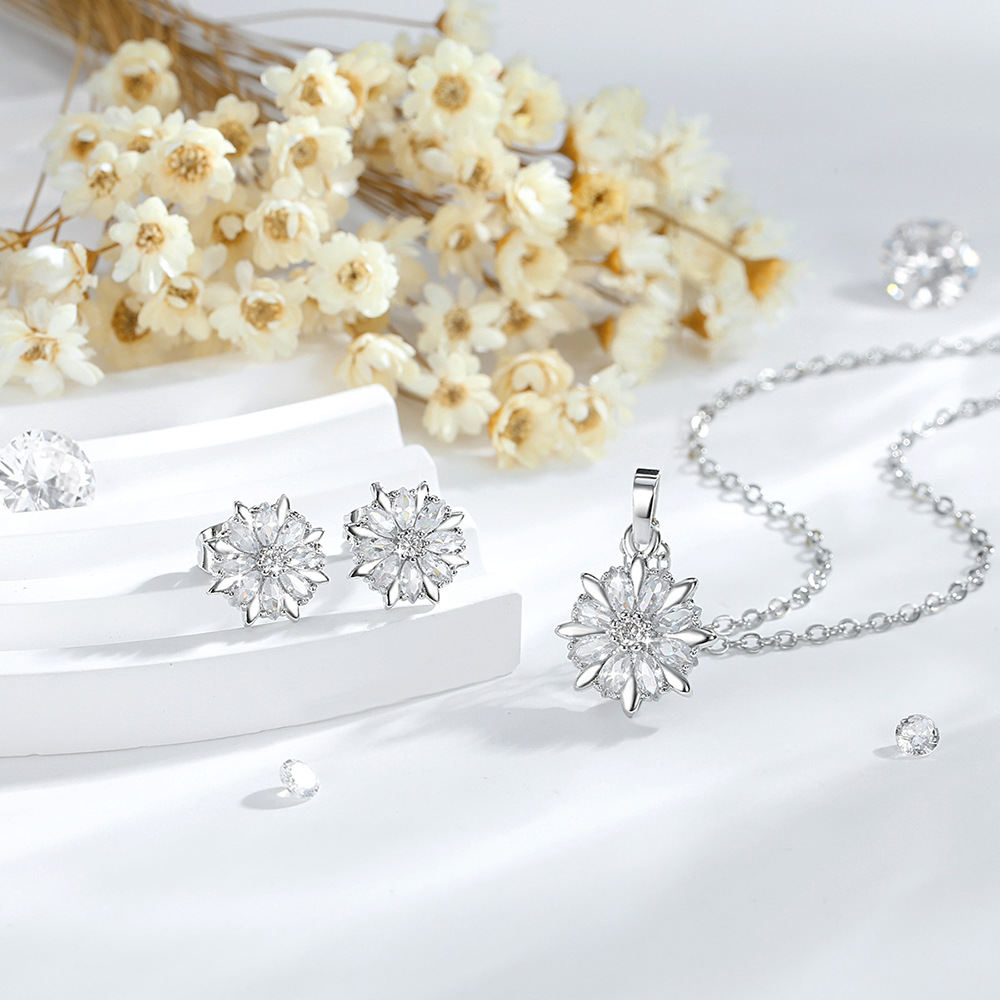 Ventas transfronterizas de flores colgante conjunto de joyería de moda damas collares de zircon orejetas de cobre chapado en oro joyería en forma de O