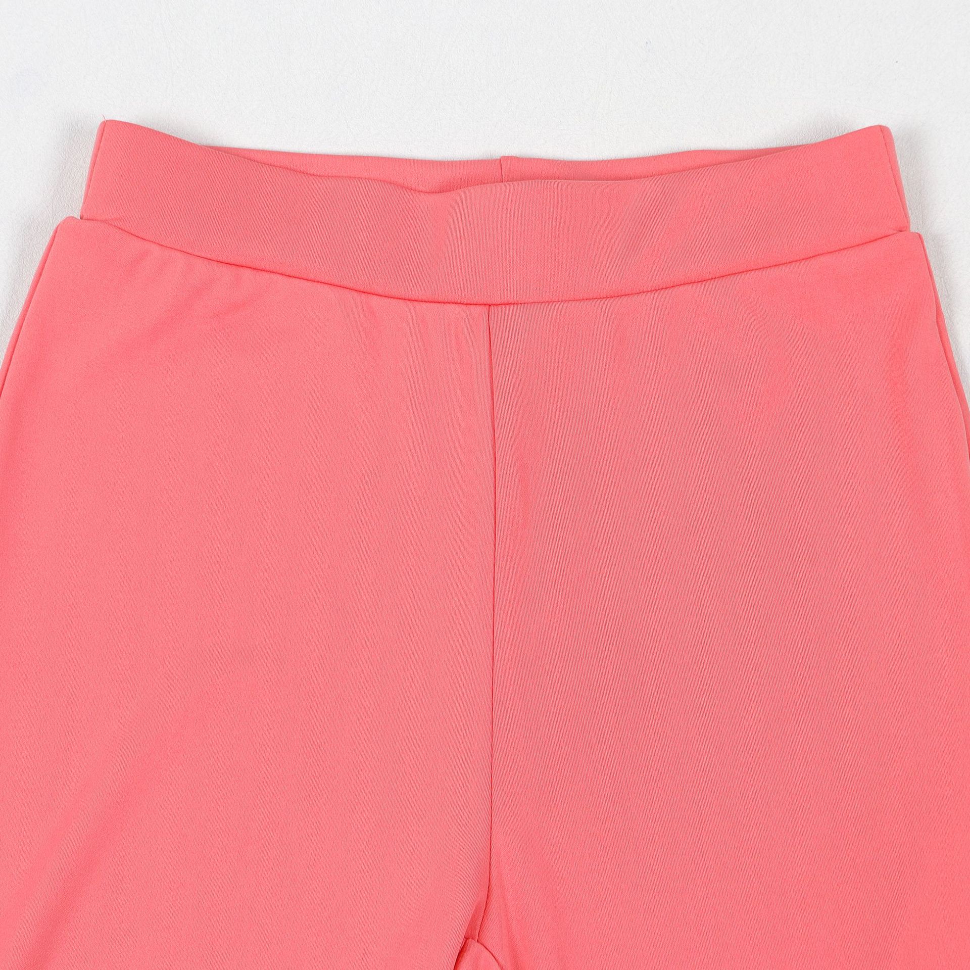 Conjunto de dos piezas de blusa y pantalón de manga larga con escote en V y cintura ajustada de color liso