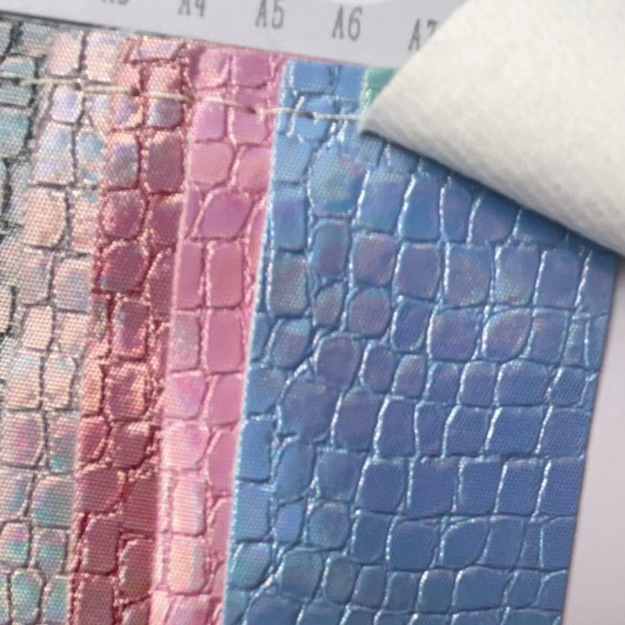 厂家直销镭射金属石头纹PU革幻彩压纹皮革装饰手袋化妆箱包盒皮料