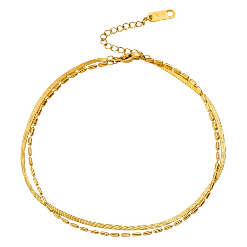 Viento frío de doble capa de hueso de serpiente tobillera de acero de titanio de las mujeres en línea popular anillo de la pierna joyería no se desvanece Accesorios de playa de las mujeres