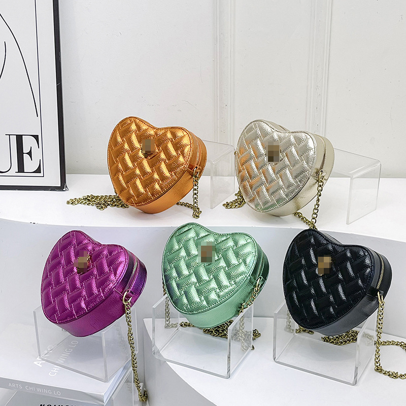 Bolso de hombro transfronterizo para mujer nueva tendencia bolso de corazón de alta gama patrón de lichi ringge bolso de mensajero de cadena de color sólido simple