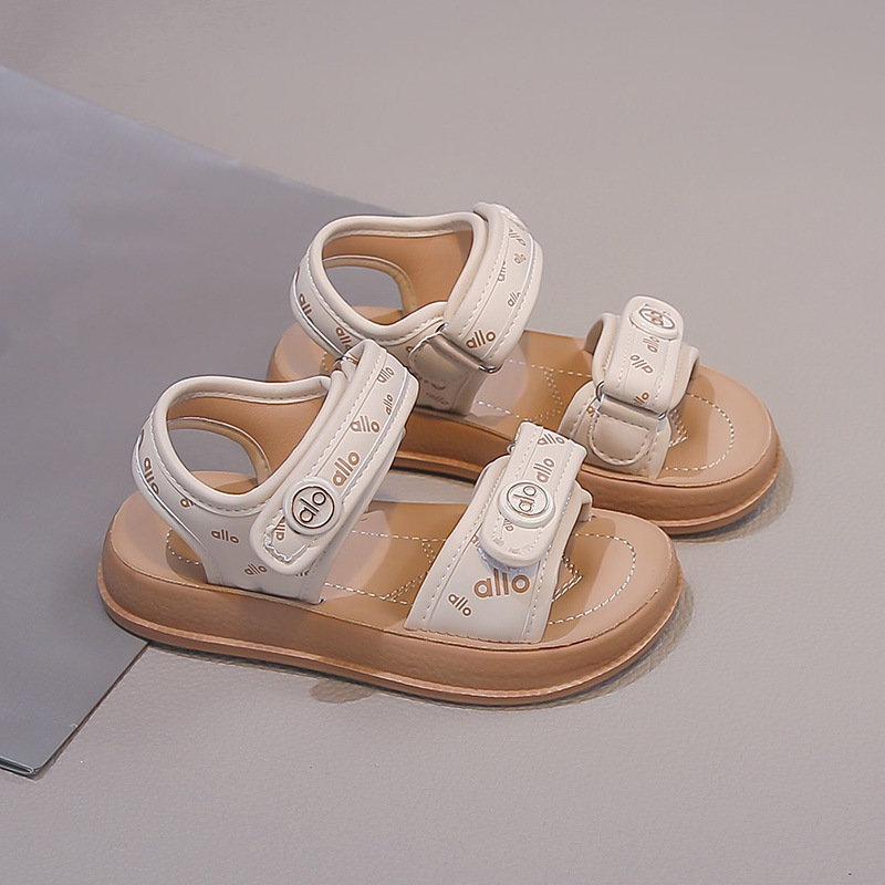 Niñas sandalias de suela suave 2026 verano nuevo niño moda versátil zapatos de playa para chicas letras zapatos Lefour zapatos
