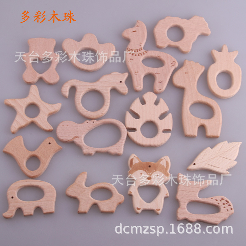 Suministro directo de fábrica al por mayor de animales de haya, anillos de madera, molares de madera para bebés de madera, juguetes y accesorios de joyería
