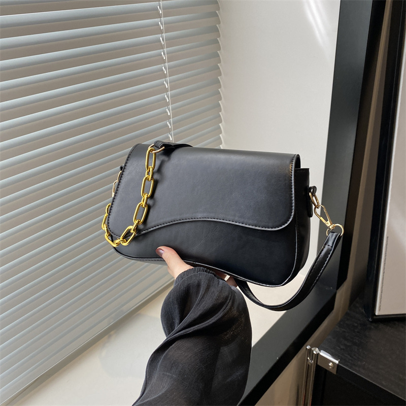 Bolso de mujer de alta calidad 2024, nuevo nicho de moda extranjera sensación de estilo de viaje simple cadena de empalme retro mochila