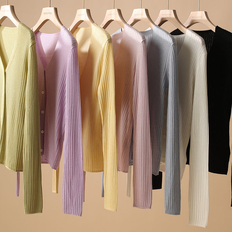 春と秋のニットのカーディガンの卸売りの薄い金の韓国版の婦人服のコートの女性のニットの雑用のセーターの露店の商品の供給源|undefined
