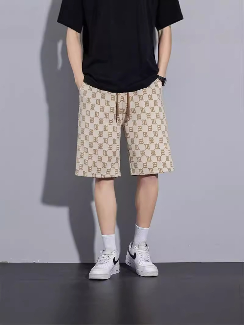 Camisas de ropa de seda de hielo delgada pantalones cortos casuales sueltos de verano estilo de Hong Kong pantalones de playa de hombre de moda pantalones casuales