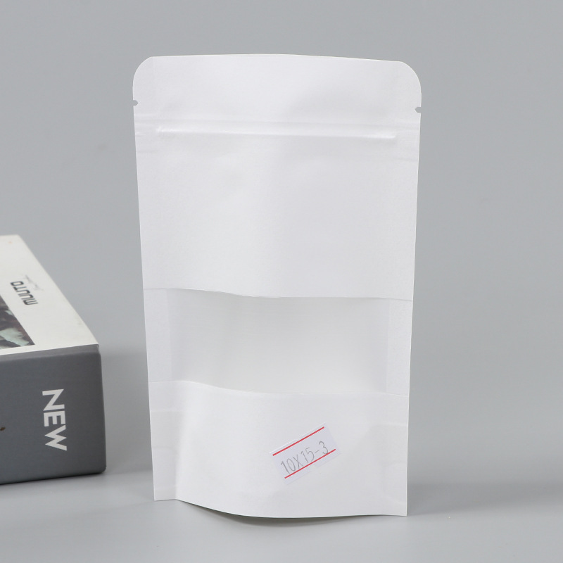 Spot bolsa de papel kraft con ventana transparente bolsa de embalaje de alimentos autosellada autoportante bolsa de té sellada de ocho lados fácil de rasgar