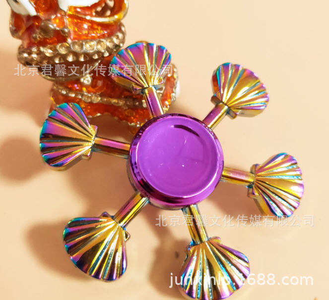 B Dedos de araña de colores, peonza, yema del dedo de metal de tres hojas, peonza de dos hojas, productos pequeños, suministro al por mayor