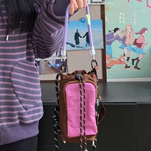 日系原宿风撞色个性设计抽绳水杯包女潮酷少女轻便逛街通勤斜挎包