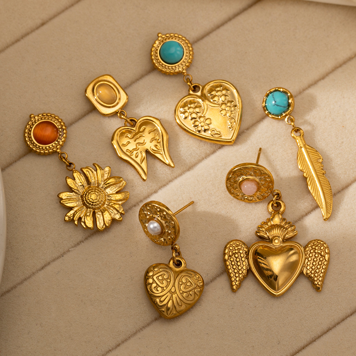 Taina europa y americana pernos de acero inoxidable compactos y exquisitos pernos de oro galvanizados 18k explosivos transfronterizos en joyas de orejas de viento para mujeres