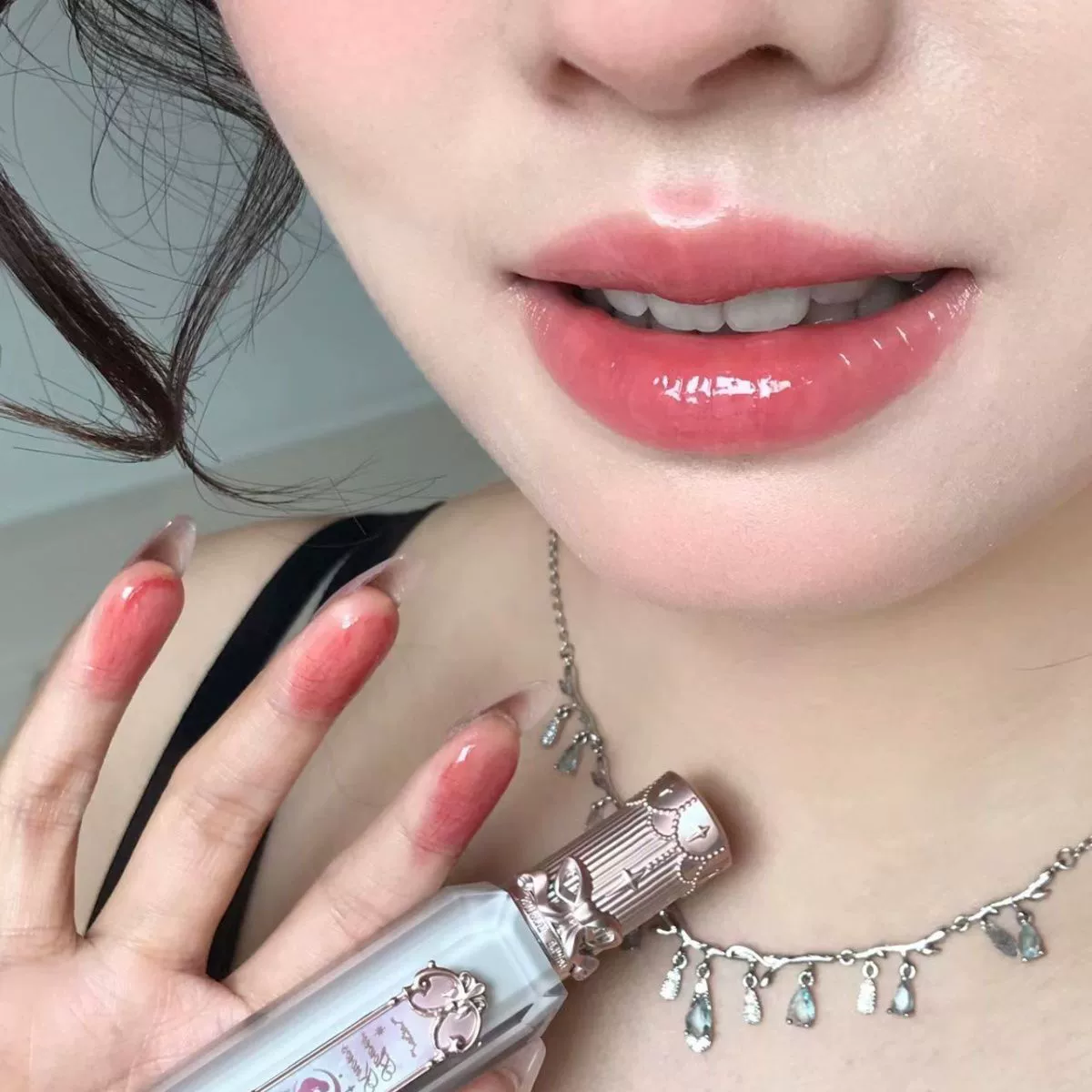 Moisturizing lip gloss, gem shimmer with mirror finish, lightweight applicator
