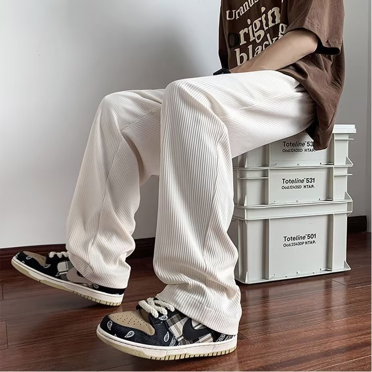 Verano delgado hombre 2026 nueva tendencia confortable pull-out pantalones largos de piernas largas pantalones de chicos rectos sueltos