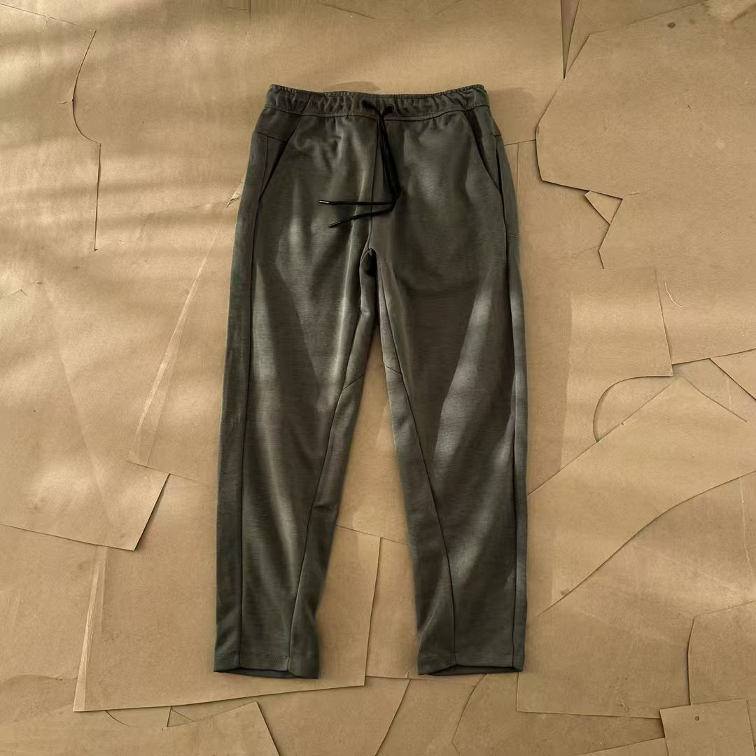 Nuevo hombre deportivo ocio al aire libre versátil punto suelto pantalones largos de piernas largas pantalones 211