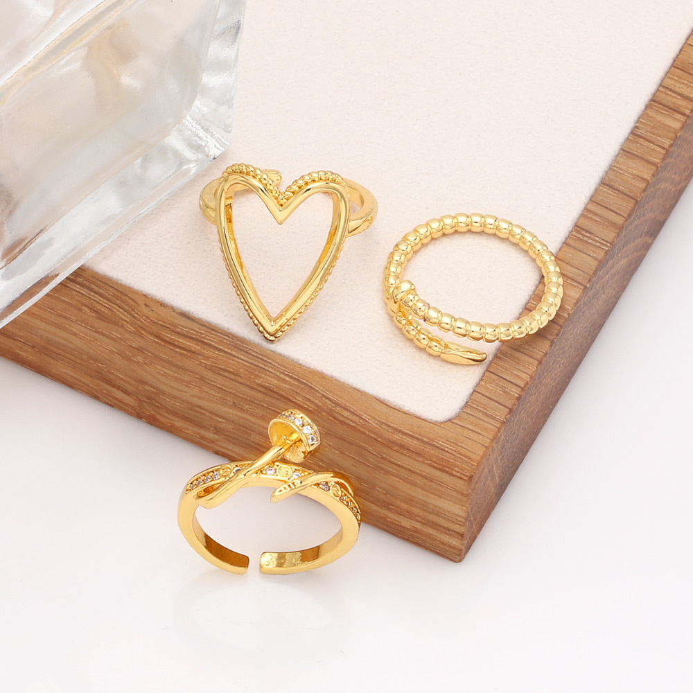 Fashion Simple Hollow Heart-Shaped Solid Color Copper Ring