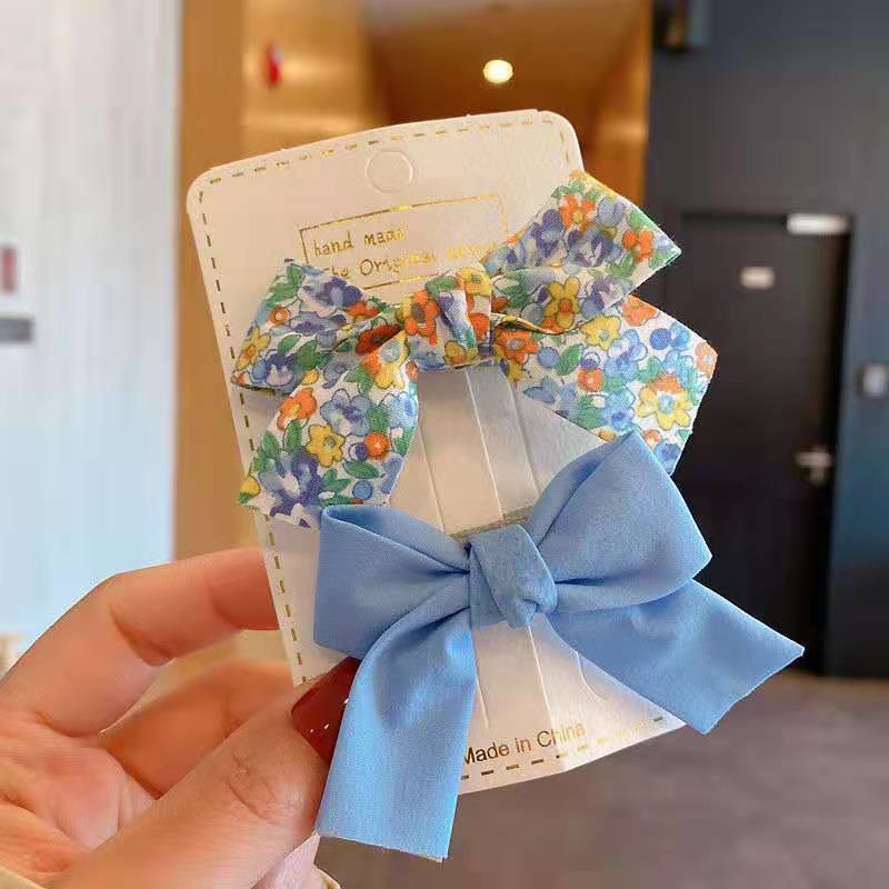 Estilo coreano fresco floral arco horquilla niños macaron color presión clip flujo mar clip lateral traje accesorios para el cabello