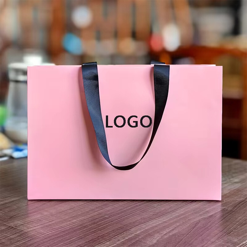 Paper Bag Customized Luxury Pink Clothing Accessories Paper Gift Bag Packaging Promotional Retail Shopping Bag with Handle