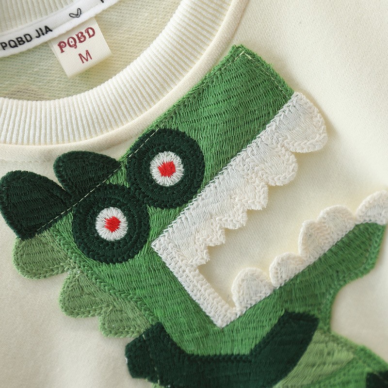 6147 Traje de dinosaurio para niños Otoño 2025 Nuevo suéter de dibujos animados para niños Estilo de primavera y otoño para bebés Conjunto de dos piezas de estilo occidental