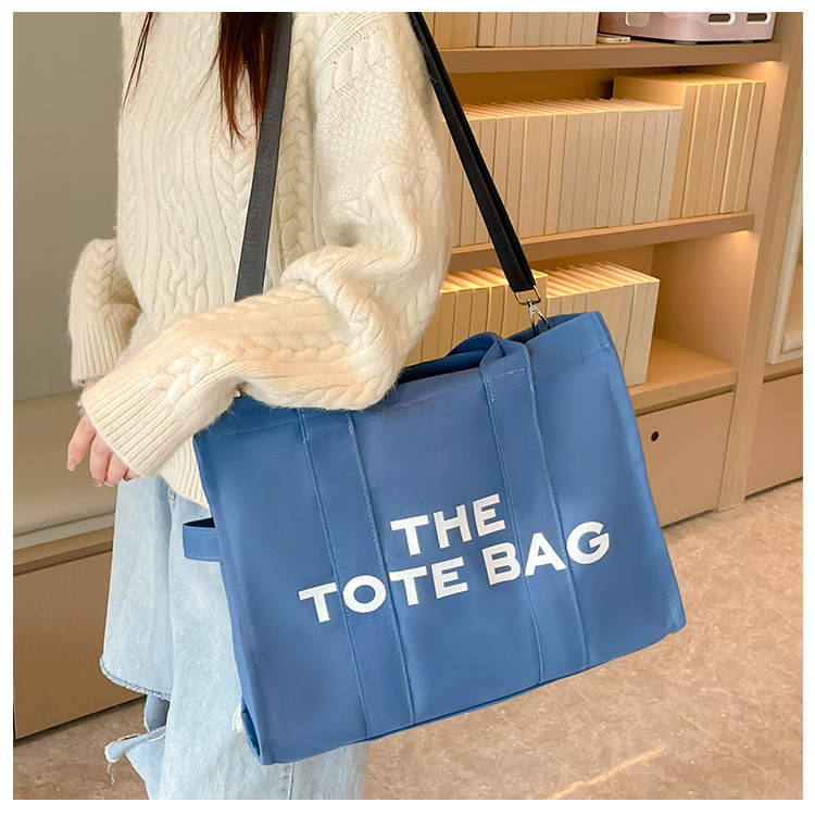 Bolso de lona Hebei Baiou para mujer, de color sólido con estampado de letras, bolso bandolera de un solo hombro con estampado de letras.