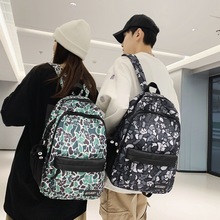 双肩包2023新款流行女学生书包印花休闲户外旅行背包大容量电脑包