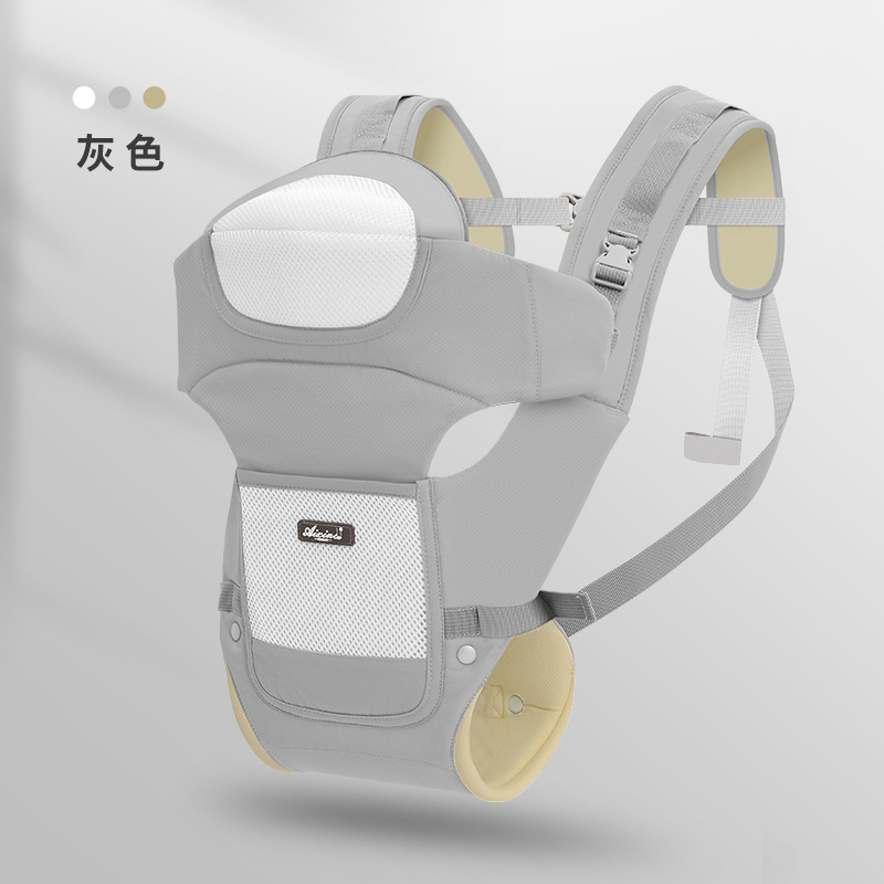 工場の現物の赤ちゃんの腰の腰掛けの赤ちゃんの背もたれの四季の多機能の通用する子供の神器を抱いています。