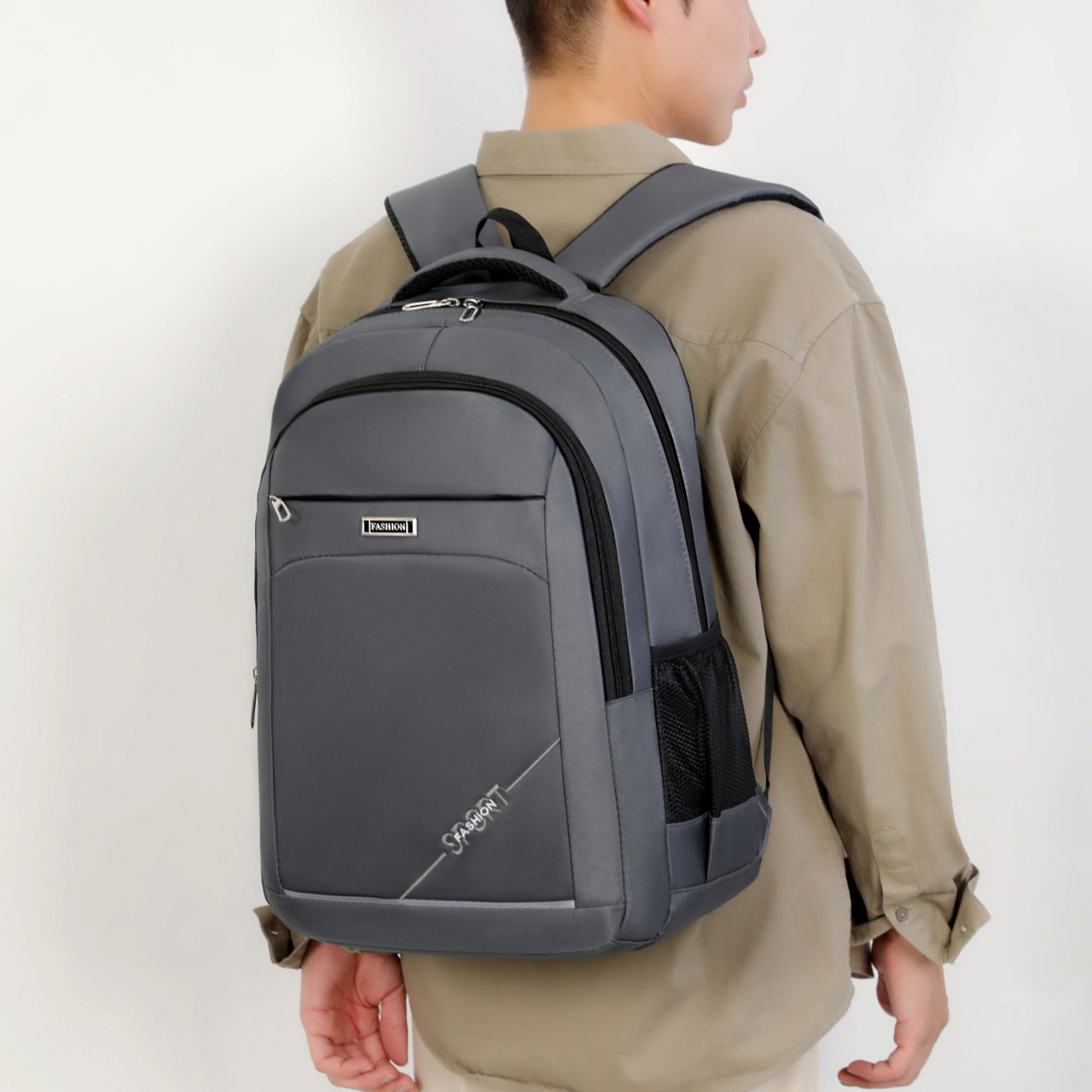 Mochila escolar para estudiantes de secundaria y preparatoria, tela Oxford para hombres, mochila de reducción de carga de gran capacidad, fabricante de mochilas de computadora de ocio de negocios de moda