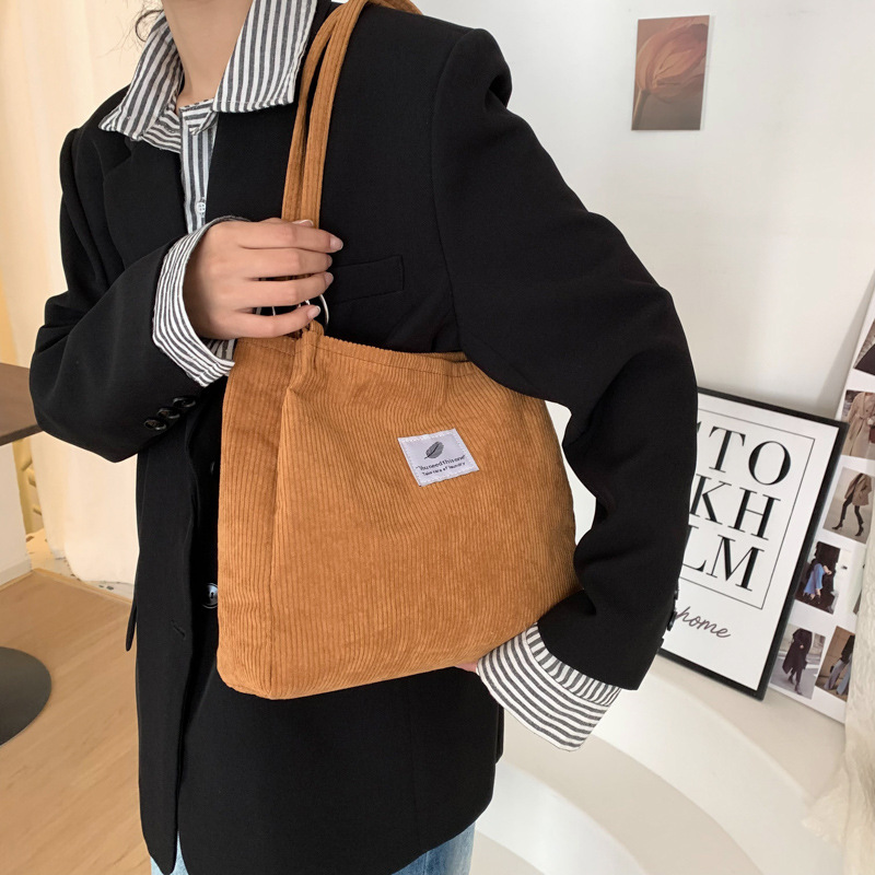 キャンバスバッグ女性シングル肩韓国版insレトロシンプル文芸コーデュロイ怠惰な風大容量手提げショッピングバッグ