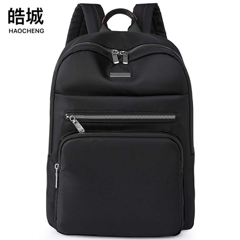 Fuente de origen 2023 nueva mochila de nailon para mujer de gran capacidad, mochila para computadora de viaje de negocios simple, mochila escolar