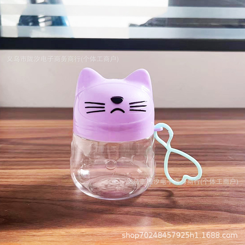 Gato de dibujos animados lindo botella de embalaje de plástico transparente de alimentos para mascotas de grado portátil caramelo con tapa soluble de frijol de color arcilla tarro lote