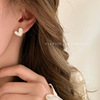 Small sophisticated fashionable black earrings, light luxury style, 2024 years