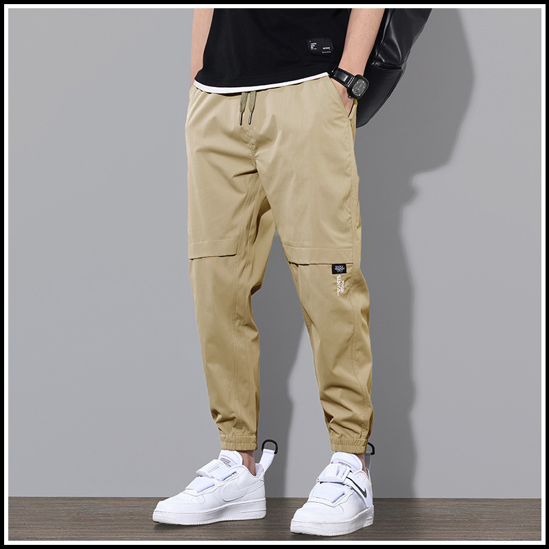 Ropa de trabajo de primavera y otoño pantalones largos pantalones casuales de los hombres pantalones sueltos atados al tobillo marca de moda de primavera y verano Pantalones deportivos delgados