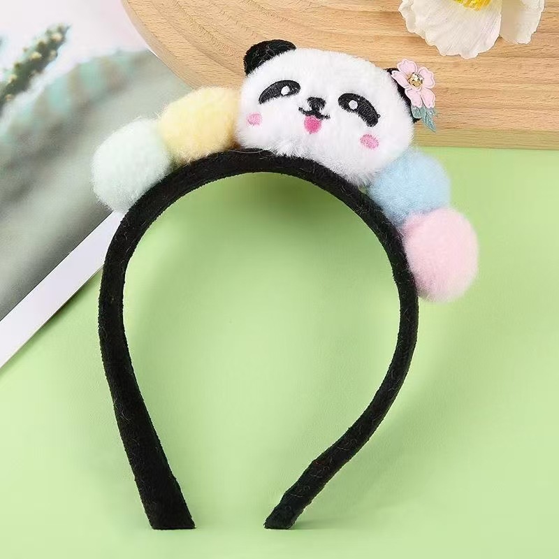 男女通用の大きいパンダのカチューシャは卸売りします。