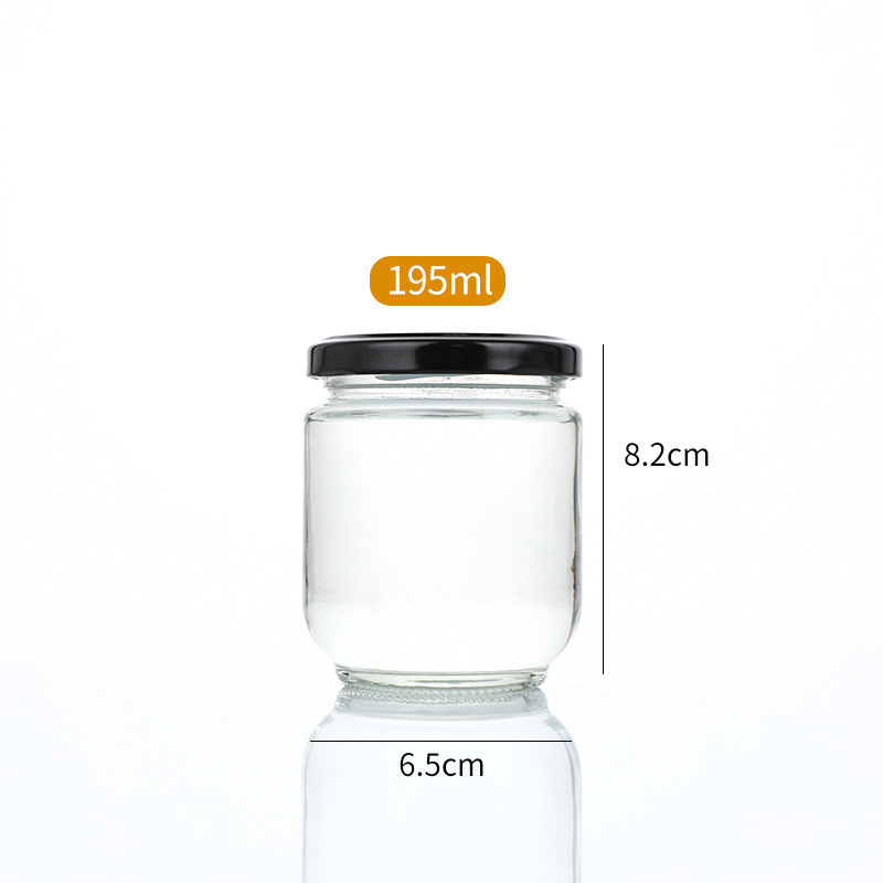 Botella de salsa redonda resistente a altas temperaturas sellada transparente resistente a altas temperaturas botella de melocotón amarillo enlatada botella de miel frutas botella de vidrio spot