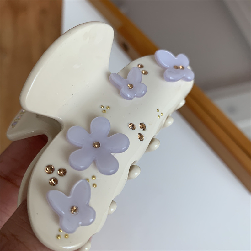 Estilo coreano Mori mariposa agarre pétalo cabeza de espalda boca de tiburón agarre del pelo industria pesada nicho diamante incrustado placa azul claro agarre del pelo