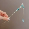 Golden bamboo Chinese hairpin with tassels