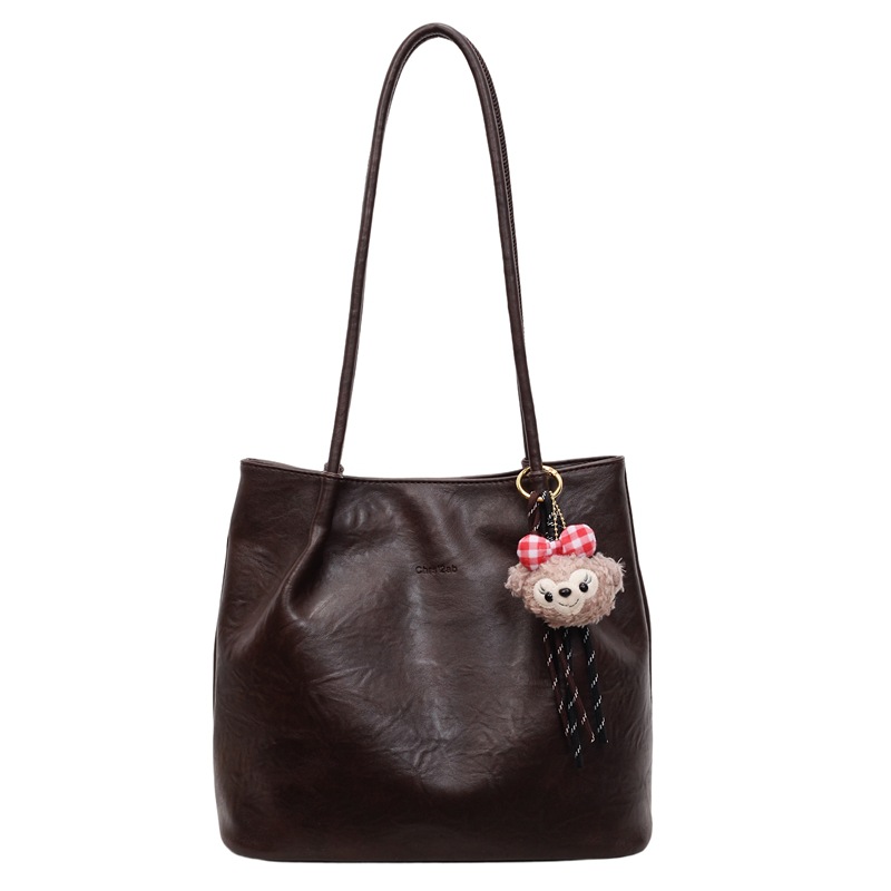 Bolsas de cubo de moda retro transfronterizas mujeres otoño / invierno 2025, nuevas bolsas de moda, bolsas de brazo, bolsas de hombro de viaje coreanas