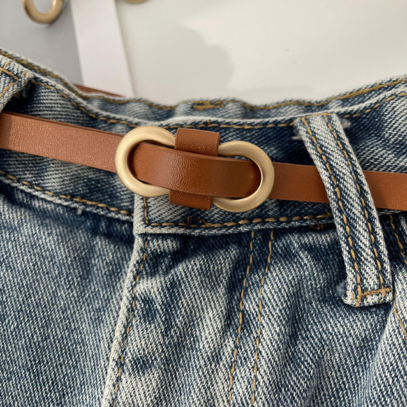 Cinturón fino de las nuevas mujeres camisa de vestir de la moda de las mujeres todo-fósforo Punch-libre pu pequeño cinturón estilo coreano pantalones cinturón color sólido