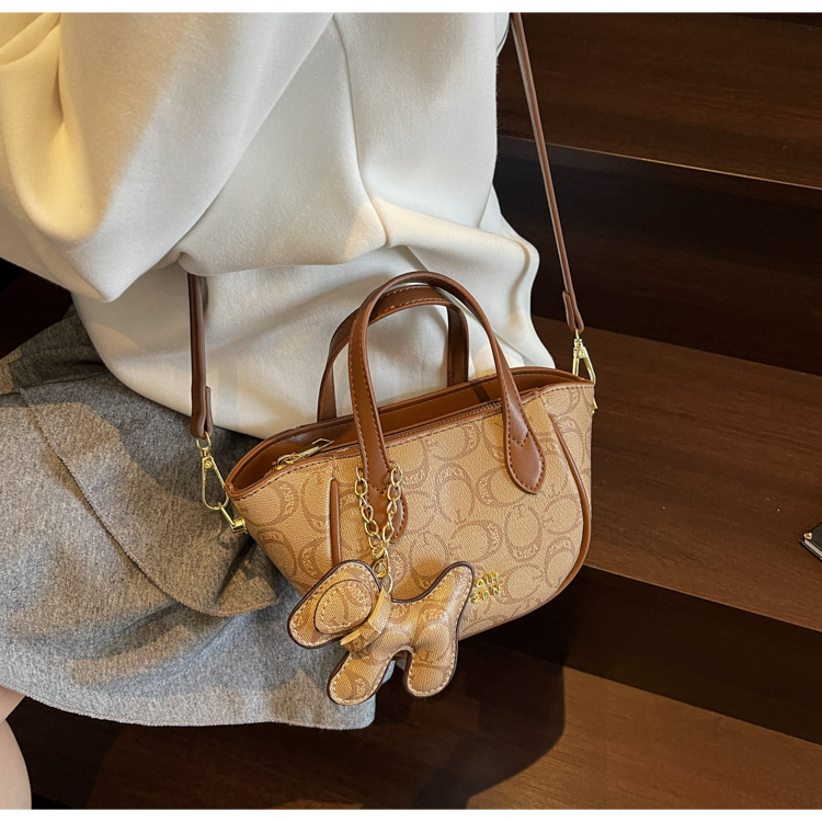 A high-end retro printed bucket bag for summer 2025, a trendy and versatile crossbody bag for women undefined