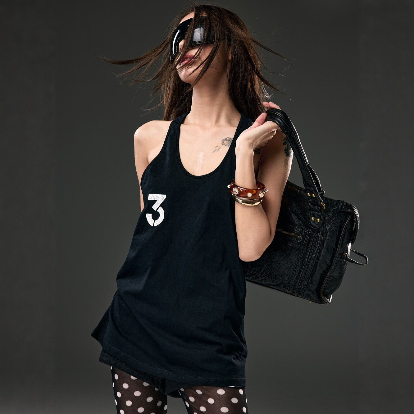 Pokiovo American-style sexy tank top t-shirt for women, summer loose casual sleeveless top, Guangzhou women's clothing wholesale.
