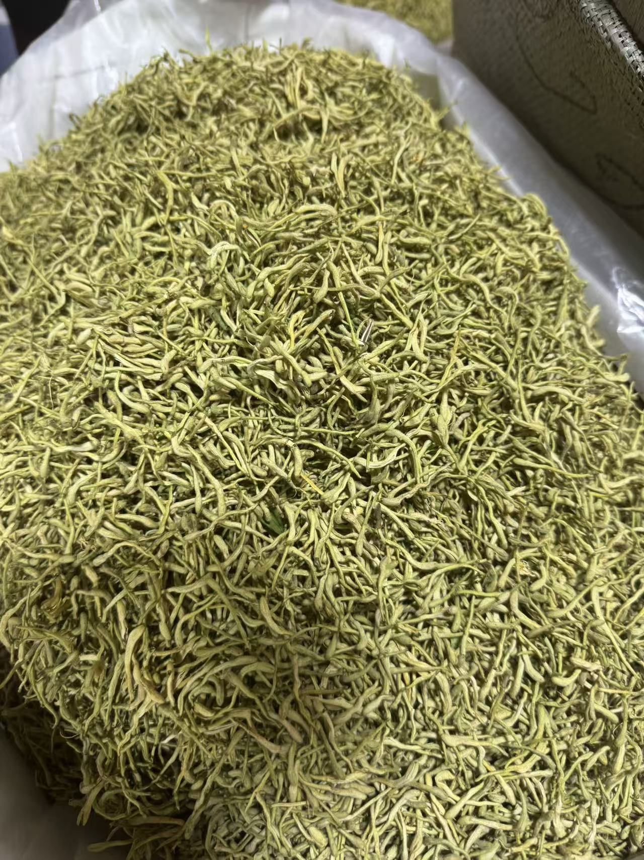 Honeysuckle Flower Tea Jin Yin Hua Dried Loose Herbal Tea 1000g Bulk Bag in use