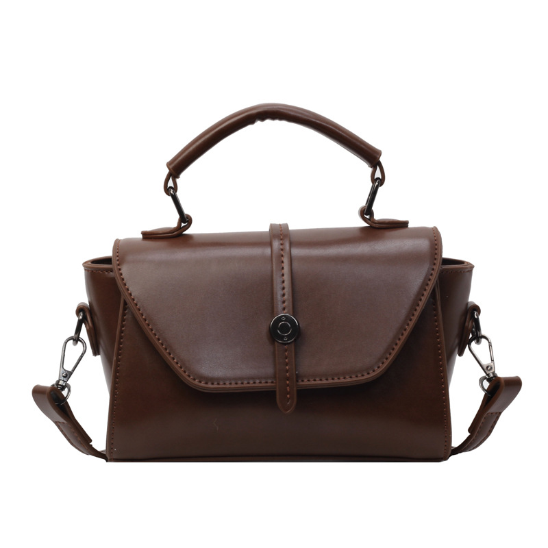 Bolso de moda de gama alta para mujeres 2024 nuevo portátil todo partido retro pequeño bolso cuadrado nicho diseño bolso de hombro