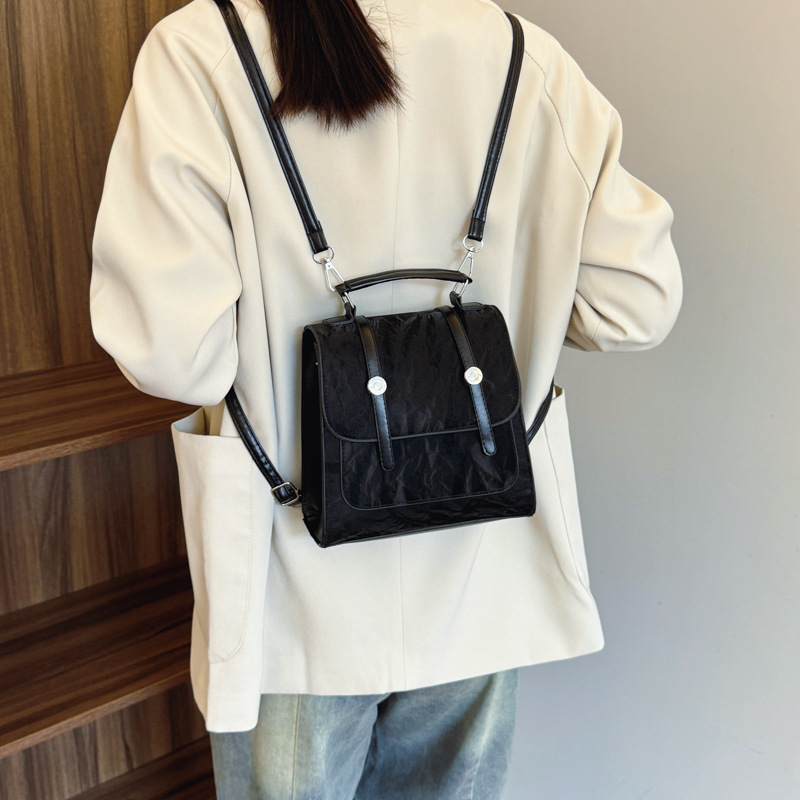 Mochila pequeña 2024 nuevo estilo de diseño de moda nicho de viaje bolsas escolares ligeras para mujeres ins para salir mochila pequeña