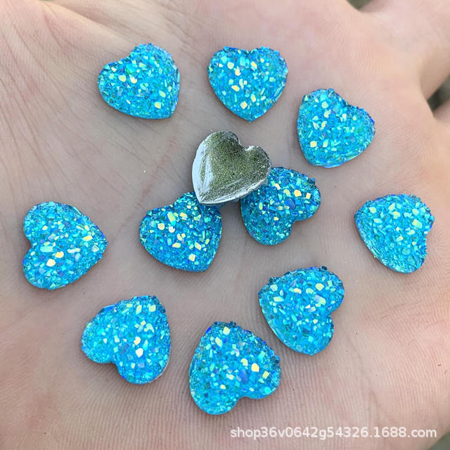 AB amor corazón mineral de cristal racimo melocotón corazón pendientes ropa DIY accesorios de decoración de resina ventas directas de la fábrica