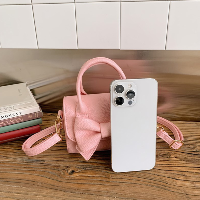 Bolsos infantiles, bolsos de niña transfronterizos, bolsos de hombro de moda coreana para niñas, bolsos portátiles de princesa.