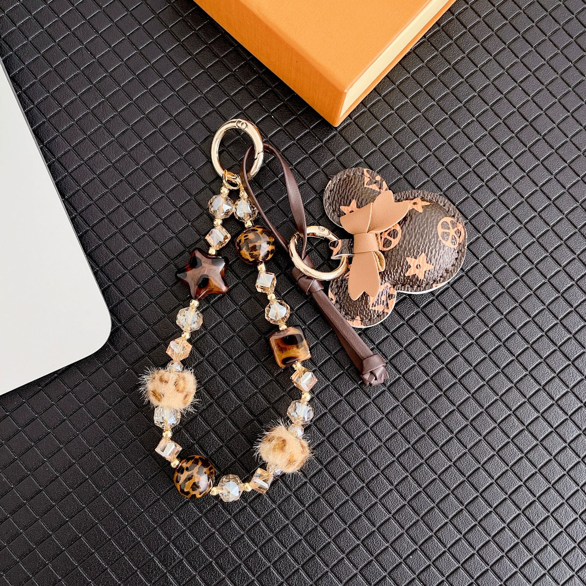 Buca mano de alta calidad de la serie de pulseras de leopardo Mickey pulseras de moda móvil mochila corta muñeca