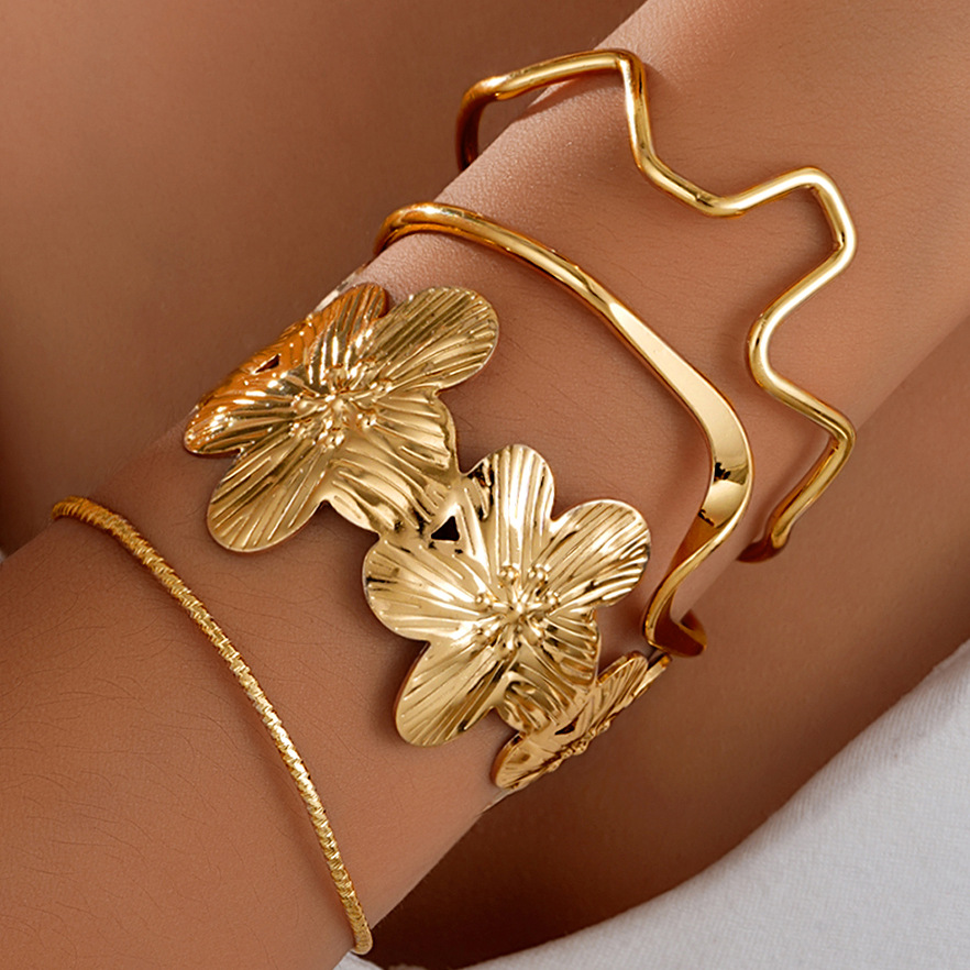 Europa y América de moda temperamento transfronterizo flor línea pulsera ecológica hierro creativo pulsera de oro simple joyas