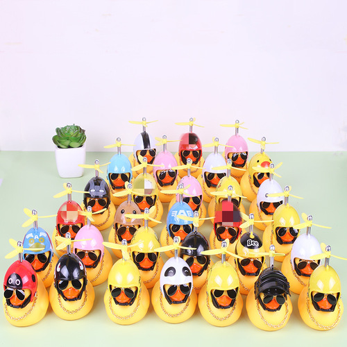 Internet celebrity social little yellow duck car ornaments, the same social Internet celebrity helmet motorcycle duck on the car
