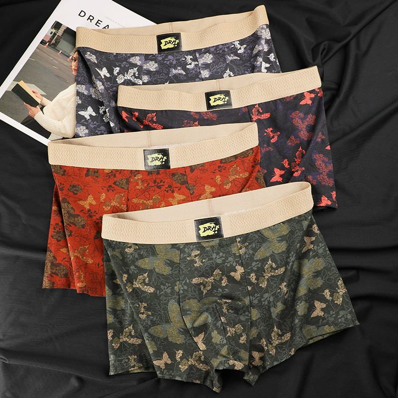 Nuevas pantalones íntimas de impresión de mariposa para hombres antibacterianas cómodas y transpirables estilo nacional americano retro cuadrangular pantalones de hombre