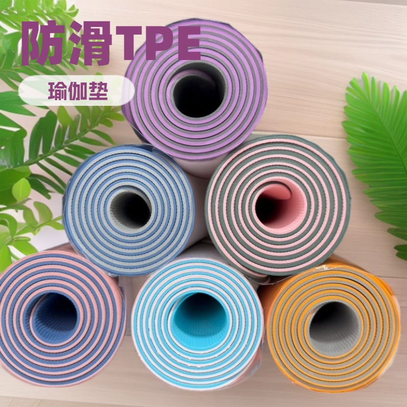Fabricante de tapetes de yoga bicolor TPE ligeramente imperfectos, venta directa, antideslizantes, para fitness, danza, insonorizados, transfronterizos, gruesos, para uso doméstico.